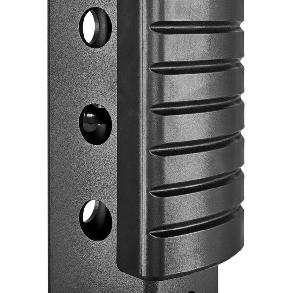 Close-up of the ATX® Trinity Tower 135 kg, a black metal structure with a glossy surface, featuring ridges on the right and circular holes on the left in an industrial design.