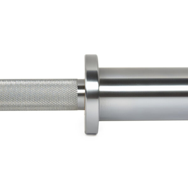 Close-up of the ATX® Warrior Power Bar IPF reveals a knurled grip on the left and a smooth, cylindrical sleeve on the right with a metallic, reflective surface.