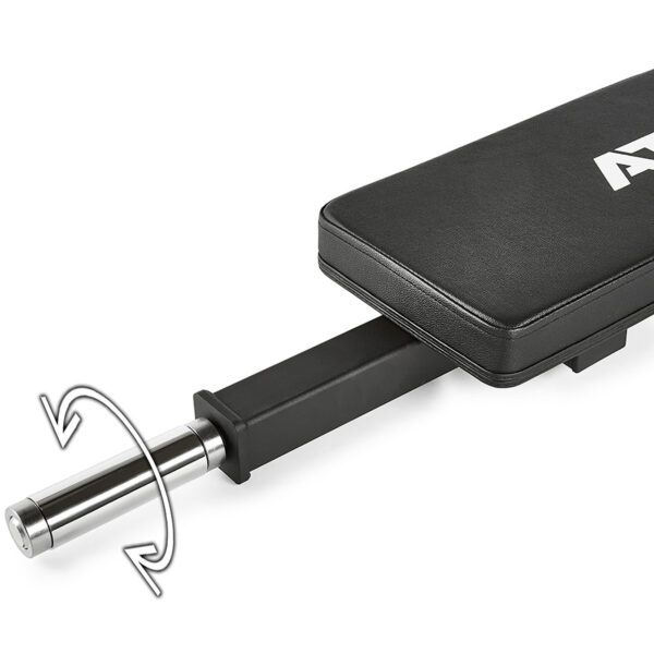 Close-up of the ATX® Hip Thruster Attachment on a black adjustable workout bench, featuring a padded surface and rotation mechanism with a metal rod marked by an arrow for customizable positions.