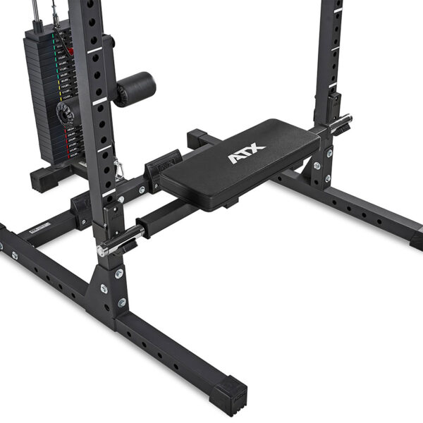 A black, adjustable weight bench with a padded seat connects to a sturdy metal frame, featuring an adjustable pulley and cable weight stack for resistance workouts, enhanced by the ATX® Hip Thruster Attachment for targeted muscle engagement.