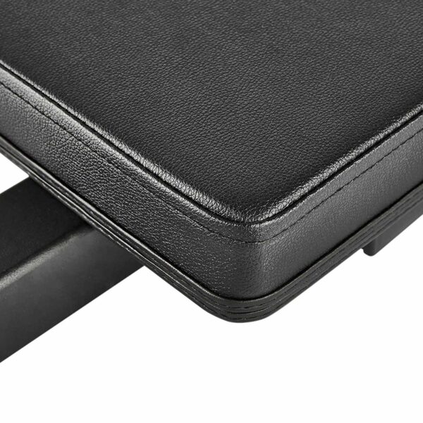 Close-up of a black leather bench seat with visible stitching, attached to a sturdy structure. The leather texture and solid build are highlighted, featuring the innovative ATX® Hip Thruster Attachment for enhanced workout versatility.
