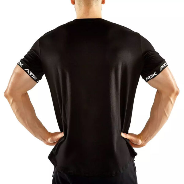 A person in an ATX® Training Shirt BLACK, featuring ATX text on the sleeves, stands with their back to the camera, hands on hips against a plain white background.