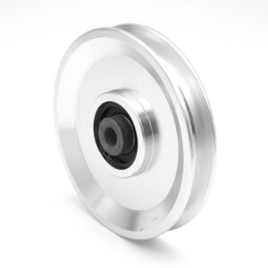 A plain background showcases a shiny silver 115mm Aluminium Pulley with a black central hub. This cylindrical wheel, featuring a smooth design, has a 10mm inner diameter and is suited for mechanical systems.