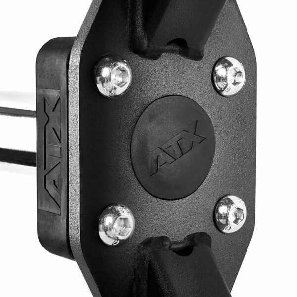 Close-up of a black ATX gym equipment joint, featuring thick metal plates and sturdy bolts, with the ATX logo prominently displayed in the center, resembling the solid construction of a trap bar.