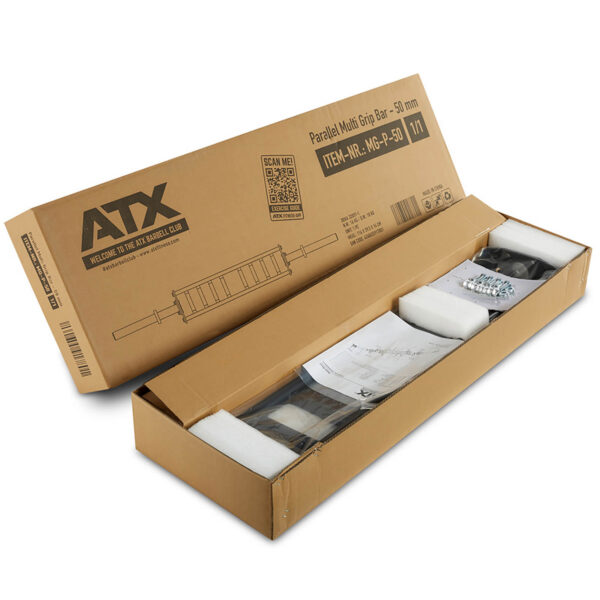 The package of an ATX® Olympic Parallel Multi-Grip Bar is open, revealing its partially visible contents wrapped in protective foam and plastic, along with assembly instructions and parts.