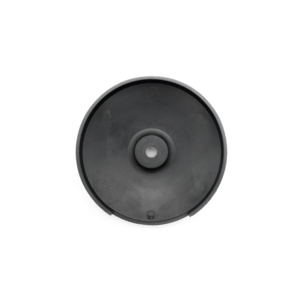 Viewed from above against a white background, the Pulley Cover 117ID is a black, circular disc with a small central hole. It features a smooth, matte surface with slight indentations.