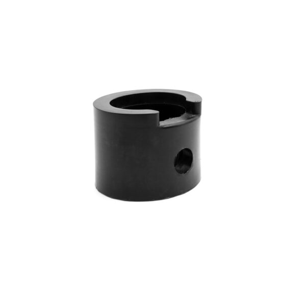 A Treadmill Deck Spring in black, featuring a cylindrical shape with a hollow center and side hole.