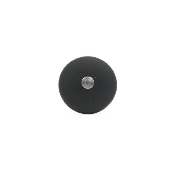 The Pop Pin M12 15mm, featuring a central metallic pin and a textured circular edge, is displayed against a white background.