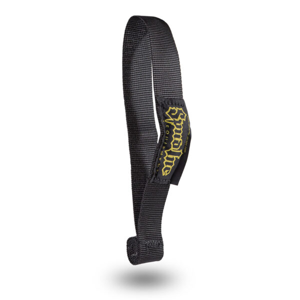 The Spud Inc Door Jammer, a black fabric wrist strap with an adjustable loop and yellow printed text on a sewn patch, stands upright against a white background.