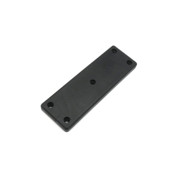 The ATX Squat Leverage Arm Rubber is a rectangular black plastic plate with five evenly spaced holes along its edges and center. Its surface is smooth with a matte finish, likely serving as a mounting bracket or cover.