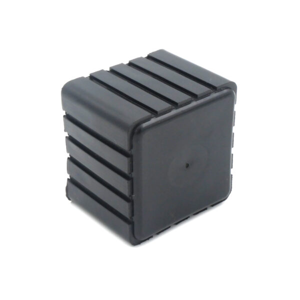 A black, rectangular Rubber Foot 40mmx40mm made of plastic, featuring ridged sides and a smooth surface, viewed from an angle.