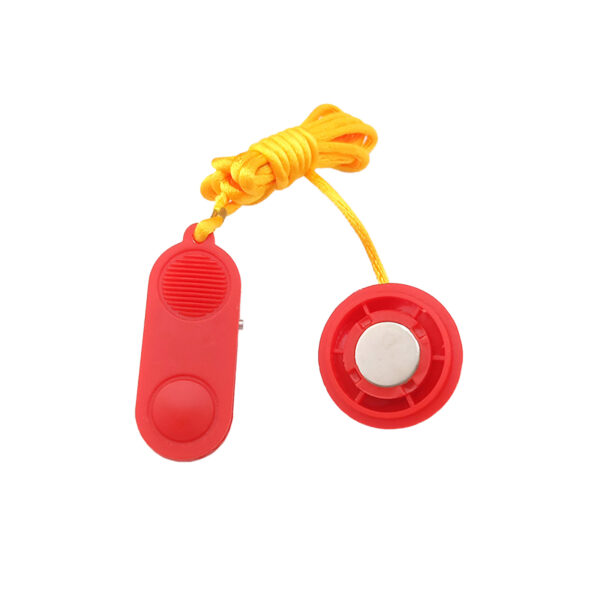 The Treadmill Safety Key 6874 is a red personal safety device with a round button and prominent yellow pull cord, featuring a simple, compact design.