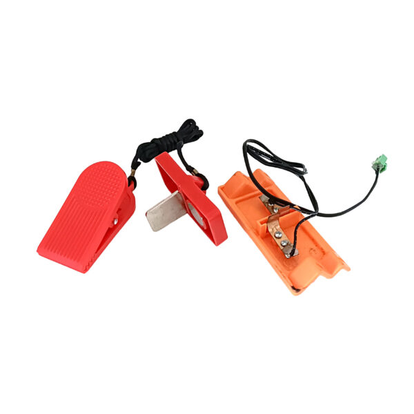 The Treadmill Safety Key 6874 features two red plastic foot pedal switches with ribbed surfaces for grip, connected by black wires to an orange plastic base with metal contact points.