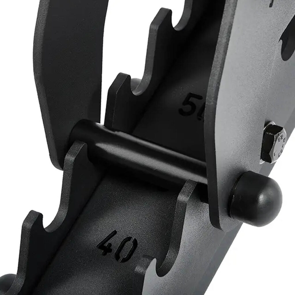 A close-up of the adjustable dumbbell weight selector at 40 and 50 is shown with notched plates and a securing pin. Alongside, the ATX® Commercial FID Bench ATX-MBX-660 enhances workout versatility, emphasizing tailored exercises through the weight adjustment feature.