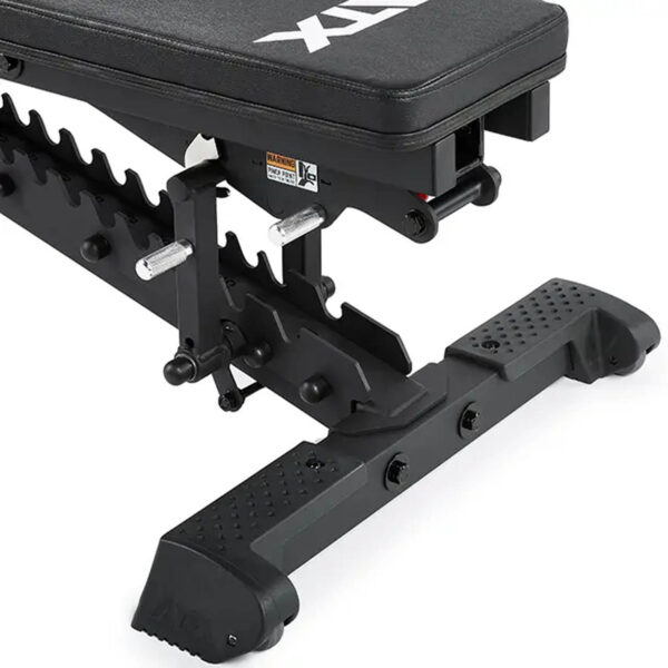 A close-up of the ATX® Commercial FID Bench ATX-MBX-660 reveals its sturdy black metal frame with ridged footrests for versatile workouts. This bench features a padded seat designed for flat and incline exercises with ATX marked in white.