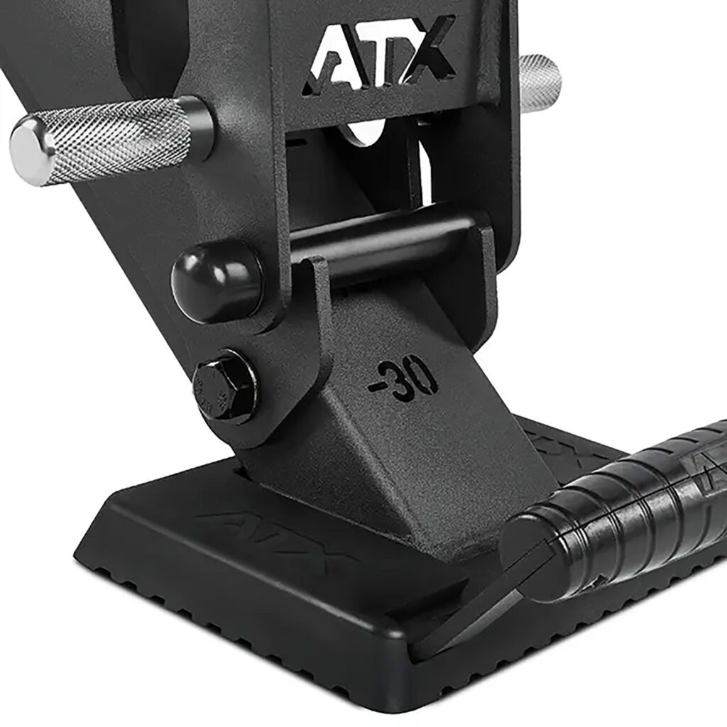 Close-up of the ATX® Warrior Bench 2.0, a black adjustable gym bench part with metal bracket marked -30, textured grips, and ATX logo against a plain background.