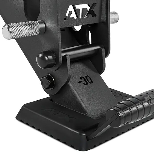 Close-up of the ATX® Warrior Bench 2.0, a black adjustable gym bench part with metal bracket marked -30, textured grips, and ATX logo against a plain background.