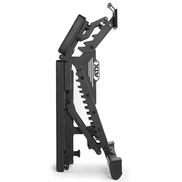 The ATX® Warrior Bench 2.0 showcases its compact design when folded vertically, featuring adjustable elements with a black finish, brand markings, and a convenient side lever for adjustments.