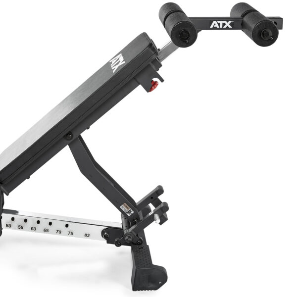 The ATX® AB Attachment features a sturdy metal frame, adjustable incline settings with visible slots, and a leg support. It includes a black padded backrest with the ATX logo on it.
