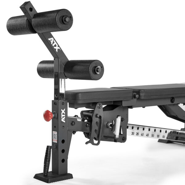 The ATX® AB Attachment is an adjustable weight bench with a black cushioned seat and backrest. It features leg support pads, a sturdy metal frame, a lever for adjustments, and a measurement scale for precise positioning.
