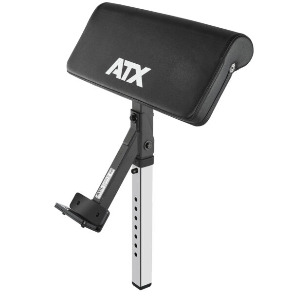 The ATX Bicep Curl Pad is an adjustable preacher curl attachment with a black padded armrest, featuring a metal frame with multiple height adjustment holes and a bracket for bench attachment.