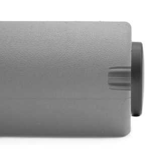 Close-up of a gray Foam Roller Cover 65mm with a textured surface and a black circular end, resembling equipment or machinery part.