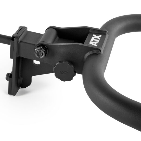 Close-up of a black metal clamp with a handle, featuring an ATX logo. The device includes a large knob for adjustments, and is attached to a mounting bracket. Its designed for secure attachment and support, likely for fitness equipment.