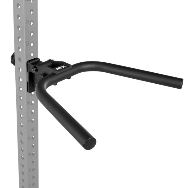 A black dip bar attachment mounted on a silver perforated metal rack. The attachment features two parallel bars extending outward, suitable for fitness and strength exercises. The rack has numbered holes for adjustable positioning.