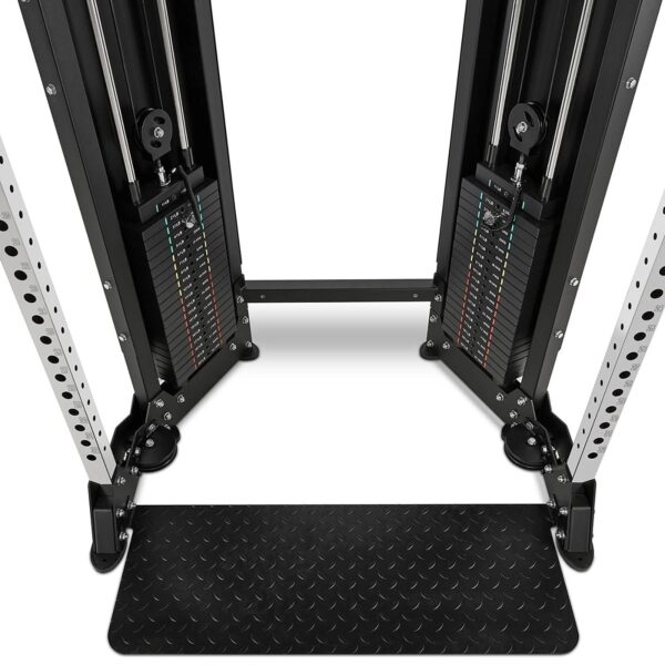 Close-up view of a dual adjustable pulley gym machine with weight stacks and a footplate. The metal frame has multiple adjustment holes and cable pulleys on each side, set against a white background.