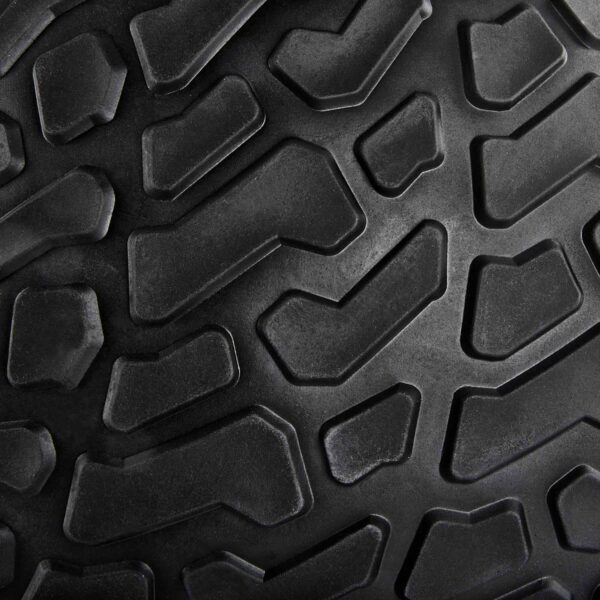 Close-up of the rugged ATX® Slam Ball, featuring a black textured surface with deep grooves and angular raised patterns designed for optimal grip.