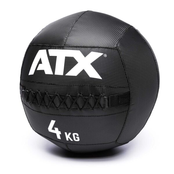 A black ATX® Wall Balls PVC, featuring 4 KG in white, a textured surface, and reinforced stitching.
