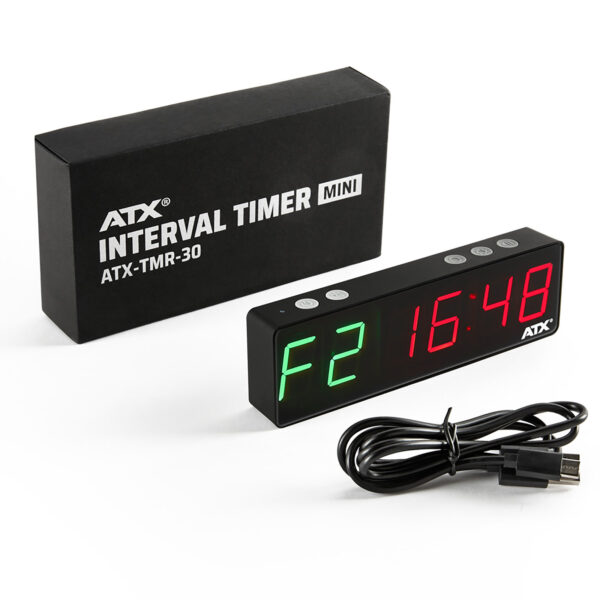 A black digital interval timer with a red and green LED display showing F21 and 16:48. The timer is beside its packaging labeled ATX Interval Timer Mini ATX-TMR-30 and a black USB cable is included.