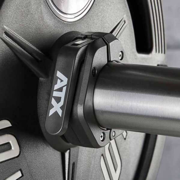 Close-up of a weightlifting barbell with an ATX® Magnetic Collar 50mm securing heavy weights. The durable collar, designed for robust construction, stands out against a neutral background, highlighting its reliability and sleek design.
