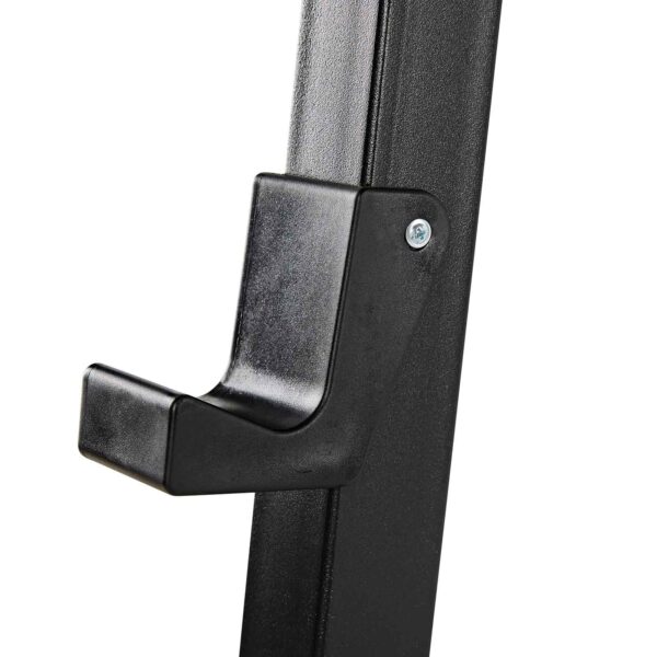 Close-up of a Wall Mounted Barbell Rack, featuring a black metal support bracket bolted to a vertical structure for secure item holding.