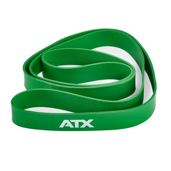 ATX® Latex Free Resistance Bands - 9 Levels, in green color, coiled in a spiral shape and perfect for training.