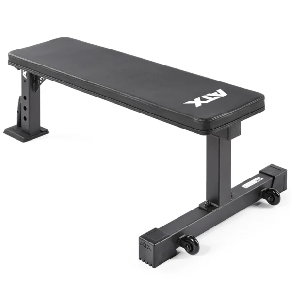 The ATX® Flat Workout Bench Attachment is a sturdy, black metallic bench with a padded surface for comfort. Equipped with two wheels on one end for easy mobility, it is an ideal choice for strength training exercises.