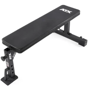 The ATX® Flat Workout Bench Attachment is a black flat weight bench with the ATX logo on its padded surface. It features an adjustable metal frame and two sturdy legs, making it ideal for strength training exercises and perfect for fitness enthusiasts.