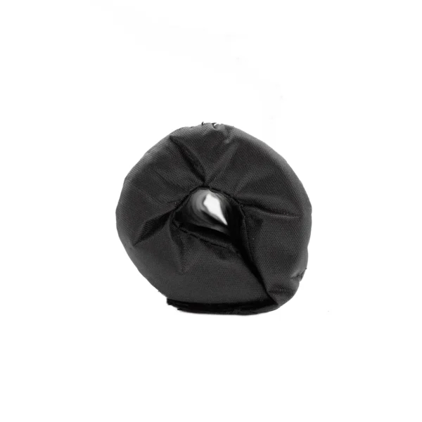 A rolled-up nylon cover, specifically designed for a barbell pad, sits tightly coiled against a plain white background. The black fabric appears durable and textured.