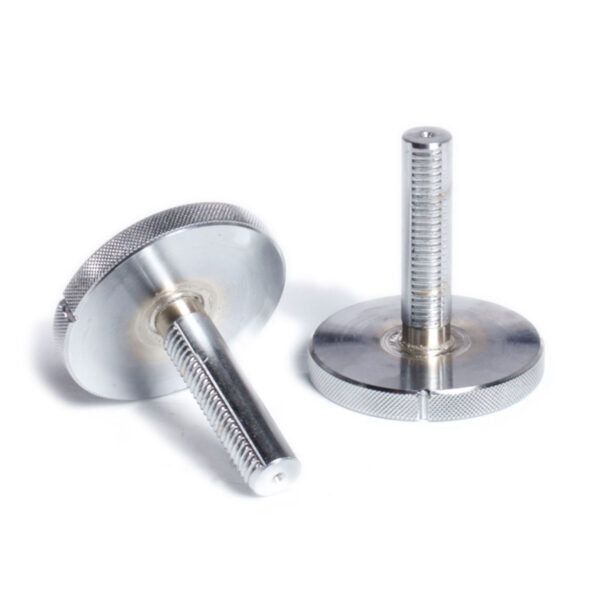 Two metal screws with knurled round heads and threaded shafts rest on a white surface, with one upright and the other lying down. The design evokes Ironmaster Quick-Lock Adjustable Dumbbells, implying easy hand adjustment for versatile use.