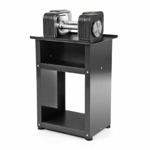 A pair of Ironmaster Quick-Lock Adjustable Dumbbells rests on a sleek black open-shelf stand. With visible weight markings and a modern design, they combine style and functionality. The minimalistic, sturdy rectangular stand is ideal for efficient home gym storage.