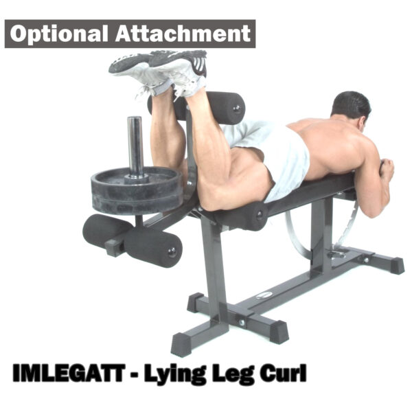 The Ironmaster Super Weights Bench user lies face down, employing an attachment labeled Optional Attachment and IMLEGATT - Lying Leg Curl, to lift weights with their legs, similar to those in a weight bench set.