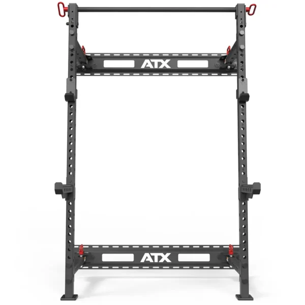 The ATX® Folding Squat Rack 500 is a black folding squat rack with red attachments and features multiple holes for adjustable equipment placement. The ATX logo on the crossbars makes it perfect for weightlifting and strength training at home or in the gym.