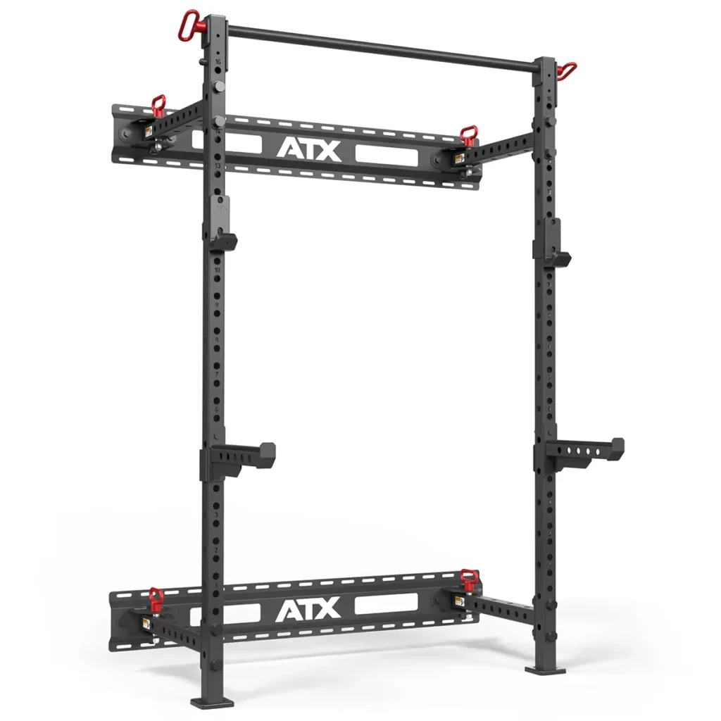 The ATX® Folding Squat Rack 500 is a sturdy black squat rack with red hooks, offering adjustable height and multiple holes for customization. Its designed for weightlifting, providing convenience and space-saving functionality.