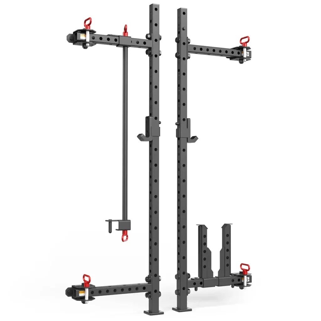 The ATX® Folding Squat Rack 500 is a black, wall-mounted squat rack featuring adjustable hooks with red clips, a safety bar, and multiple holes for easy customization. Its compact design makes it perfect for any home gym setup.