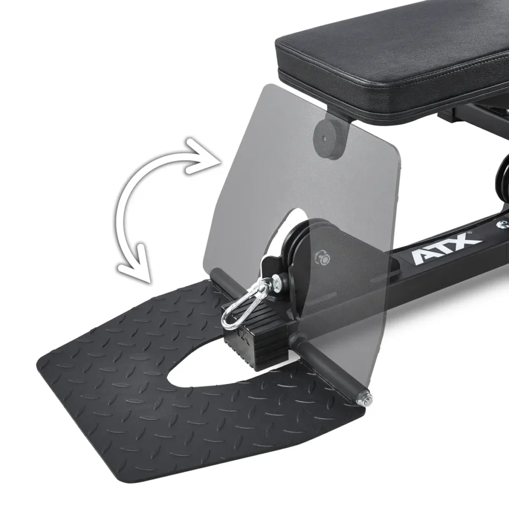 Close-up of a black adjustable workout bench featuring the foot lever mechanism found in the ATX® Cable Lat Pull Down Machine. It includes a metal pin, textured footplate, and an arrow indicating movement, with ATX printed on the frame.