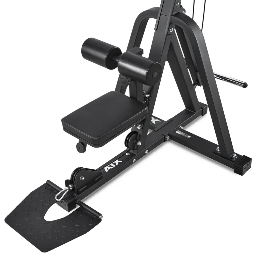 The ATX black and silver seated calf raise machine includes a footplate, seat, and lower leg padded supports for focused calf workouts. Its precision complements the versatility of the ATX® Cable Lat Pull Down Machine in any gym setting.