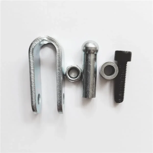The Gym Cable U Bracket Kit includes five replacement metal hardware pieces on a white background: an essential U-shaped bracket, two spare nuts, a cylinder with a round top, and a bolt.