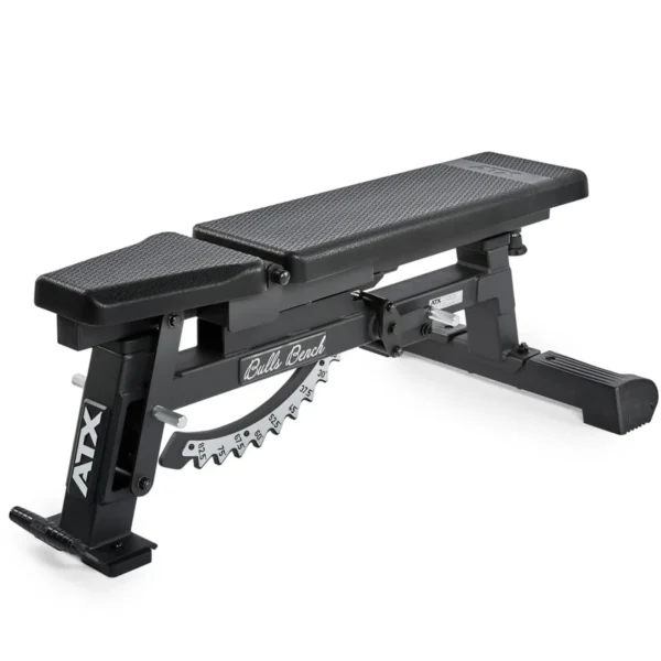 A black ATX® Warrior Bench - Slim PU features a textured surface and numbered incline adjustment mechanism, offering versatile workout positions.