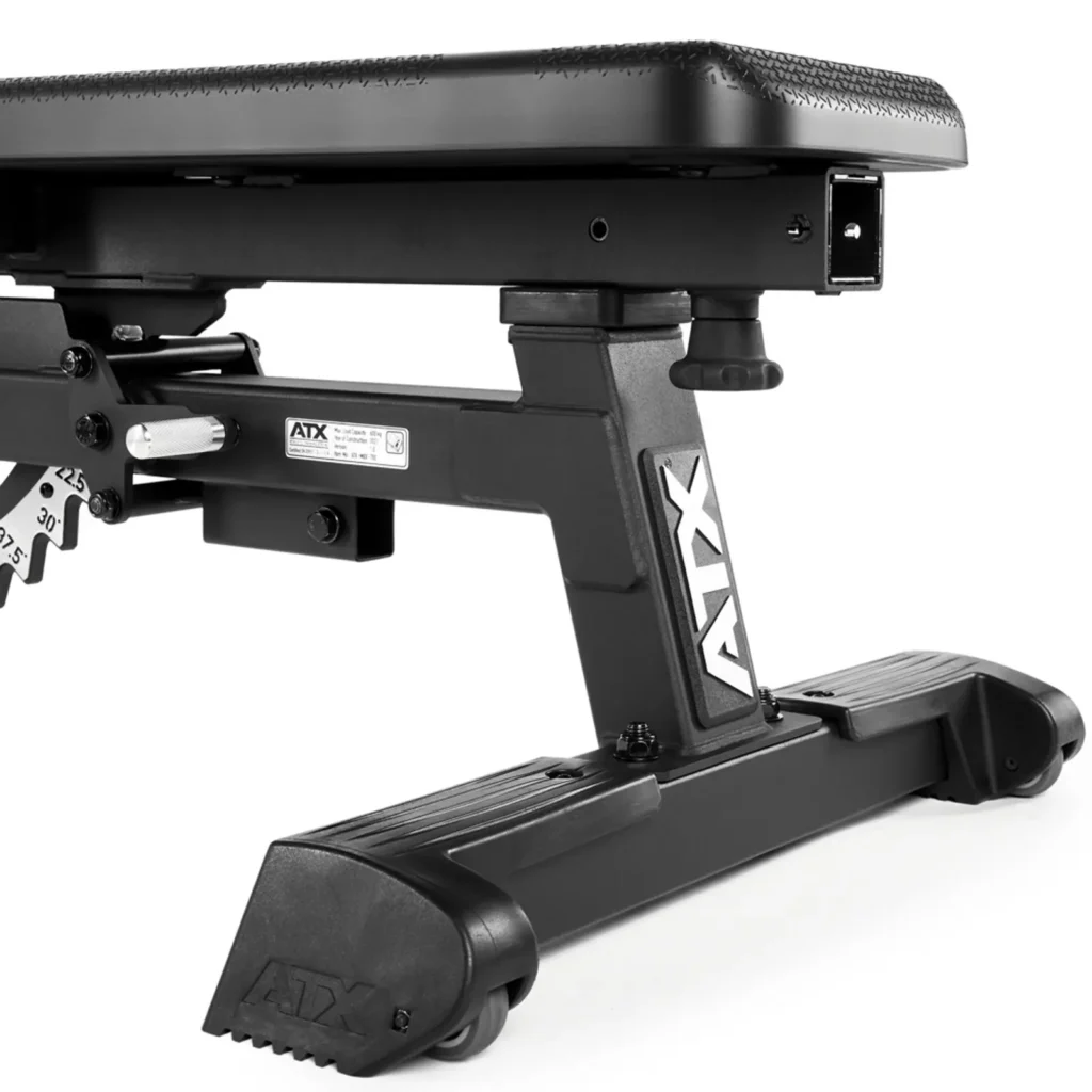 Close-up of the ATX® Warrior Bench - Slim PU (Copy), a black adjustable weight bench with a sturdy metal frame and wheels for easy movement, displaying the ATX logo on the side, set against a white background.