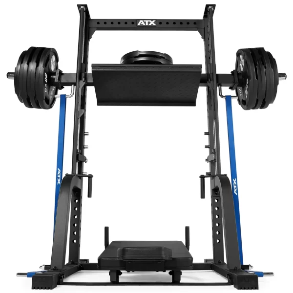 A heavy-duty leg press machine with a robust black and blue frame. It features multiple weight plates loaded on both sides and a textured footplate. The ATX logo is visible at the top of the machine.